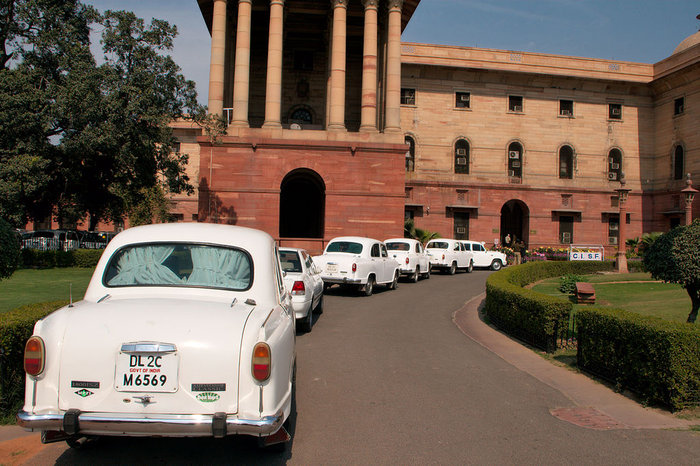 1024px-Official_Hindustan_Ambassador_cars_parked_outside_North_Block,_Secretariat_Building,_New_Delhi.jpg