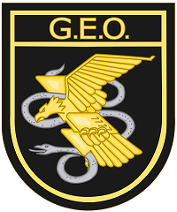 800px-Emblem_of_the_Spanish_National_Police_Corps_Special_Group_of_Operations.svg.png