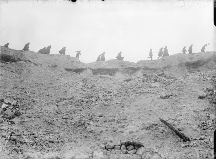 Troops_passing_Lochnagar_Crater_Oct_1916_IWM_Q_1479.jpg